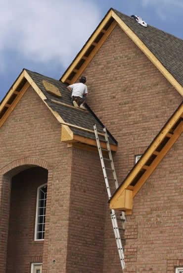 Maison avec toiture et façade rénovées